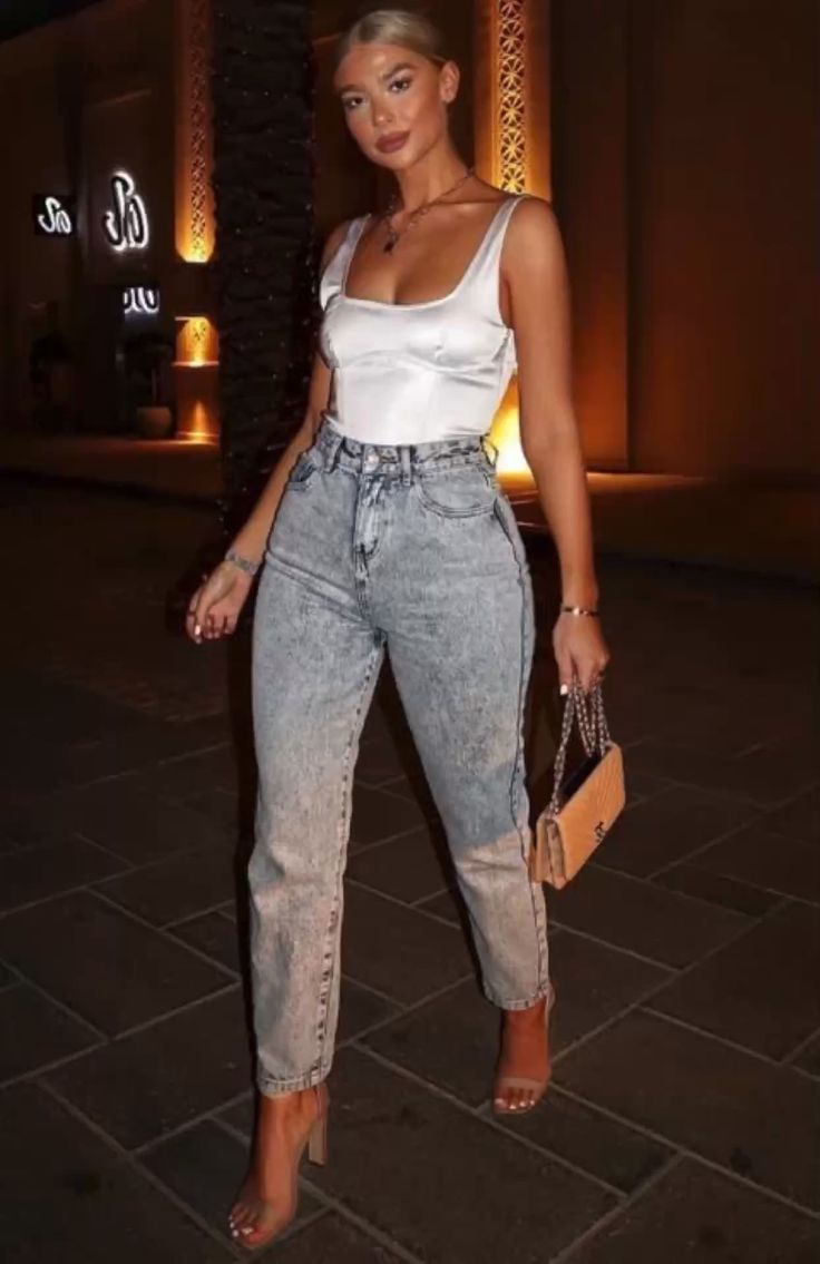 White Top with Acid-Wash Jeans and Clear Heels